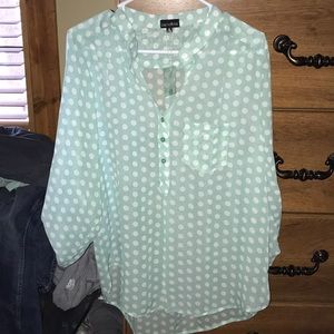 Green polka dot blouse